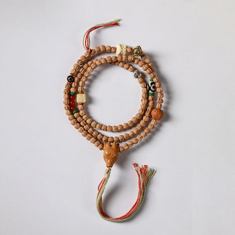 Tibetan Bai Xiang Zi 108 Mala | Sandalwood & Deer Head Prayer Beads