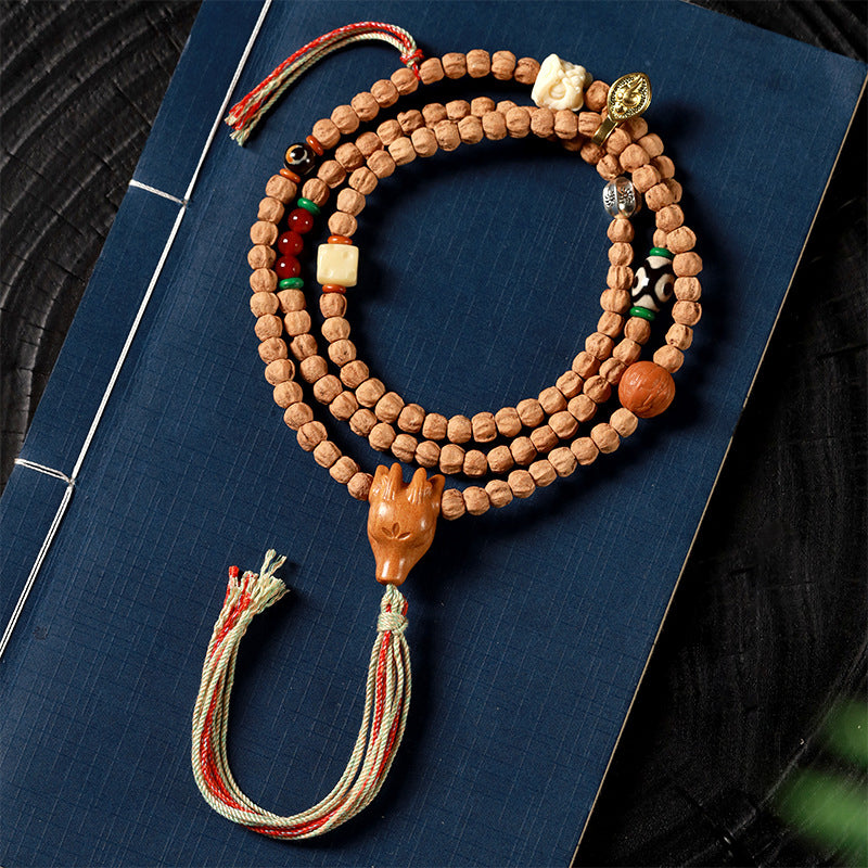 Tibetan Bai Xiang Zi 108 Mala | Sandalwood & Deer Head Prayer Beads