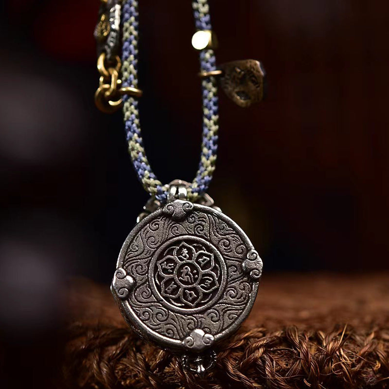 Handmade adjustable braided necklace with Yellow Jambhala talisman