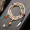 Tibetan natural bone 108 mala bracelet with hand carved vintage bone pendant