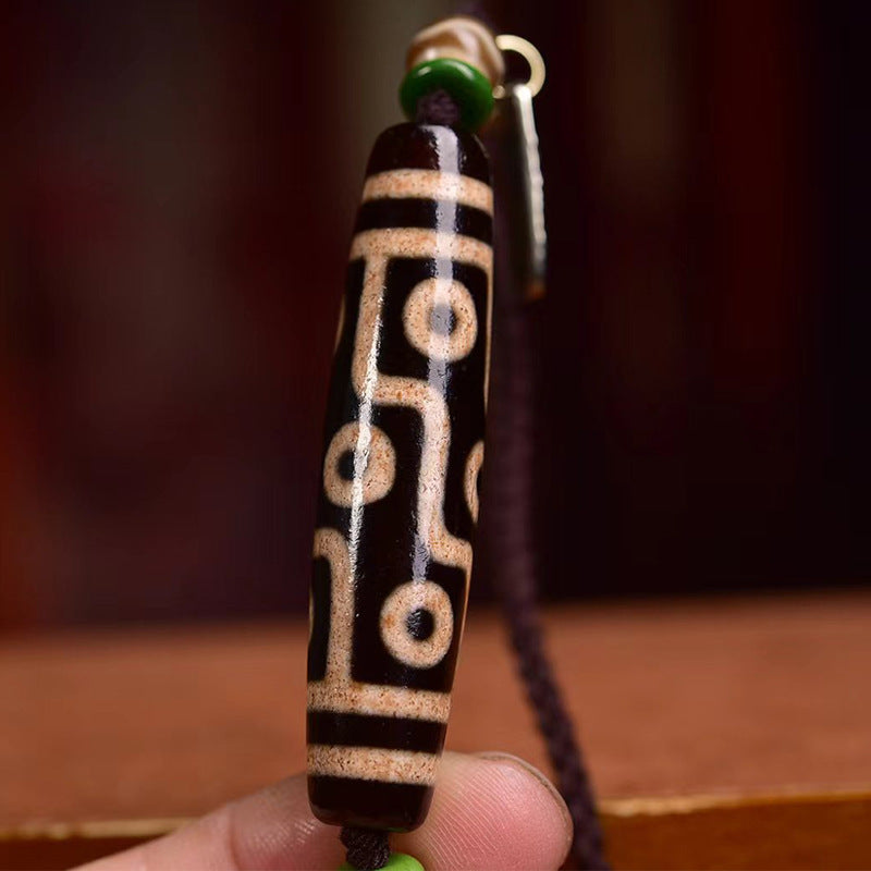 Tibetan nine-eye dzi amulet pendant for luck and daily protection