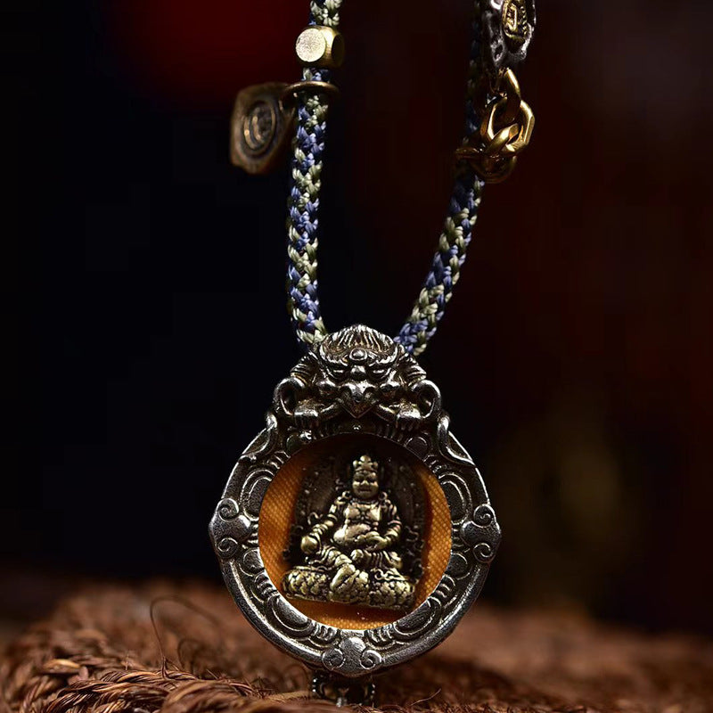 Yellow Jambhala wealth amulet gau box pendant with braided rope