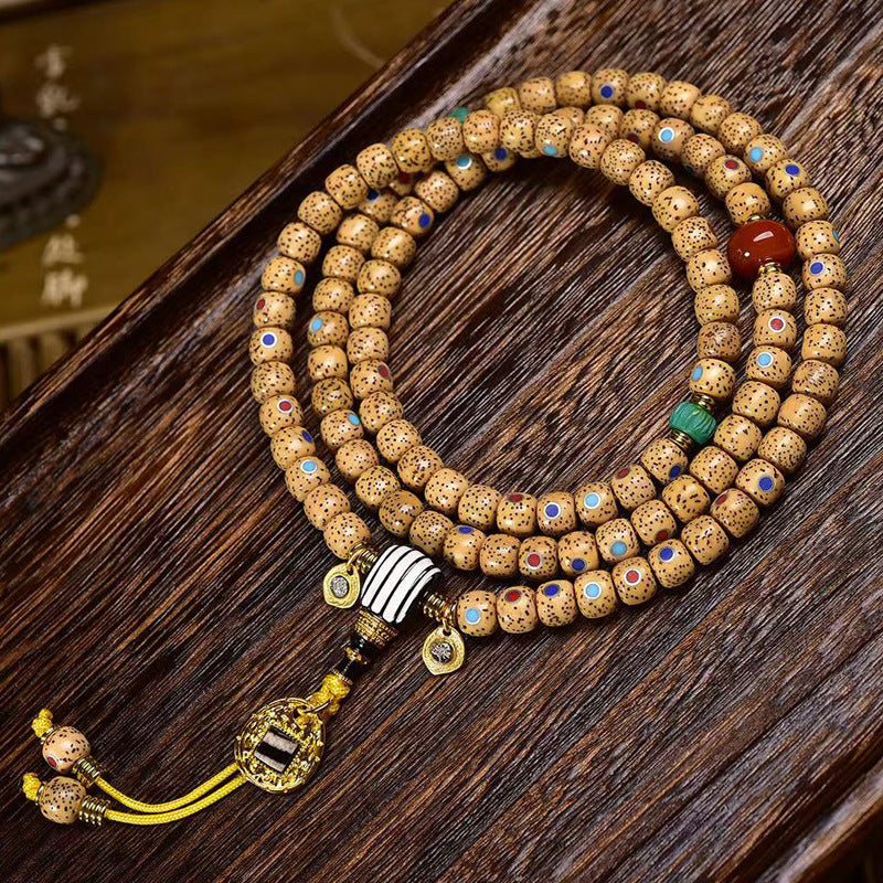 Aged star moon bodhi 108 bead prayer mala with colorful inlay and red agate accents