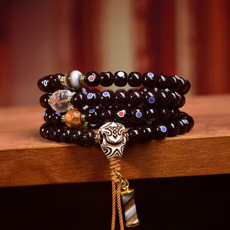 Natural Cinnabar Star Seed Bodhi Mala — 108 Bead Meditation Bracelet showcasing intricate design and spiritual essence.