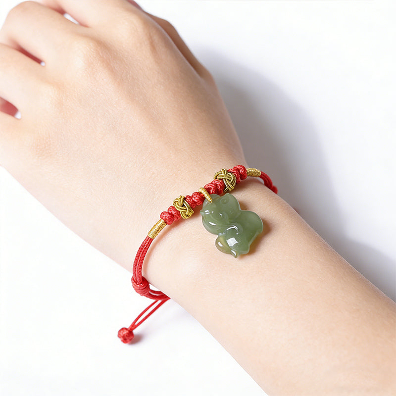 Handmade Hetian Jade Horse Red String Bracelet - 2026 year of the horse bracelet, featuring a jade charm and red string.