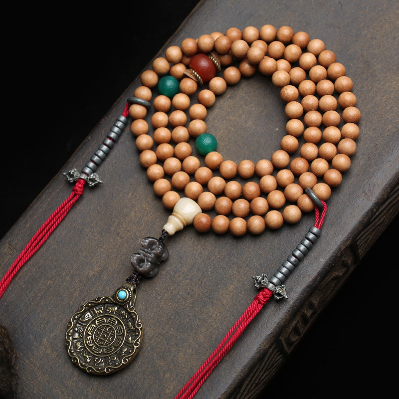 Authentic sandalwood 108 mala beads with Nine Palace Diagram pendant front view