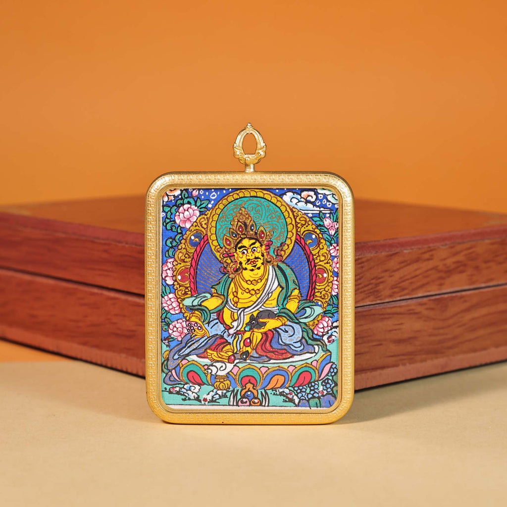 Hand-painted Yellow Jambhala miniature thangka in copper gold-plated frame
