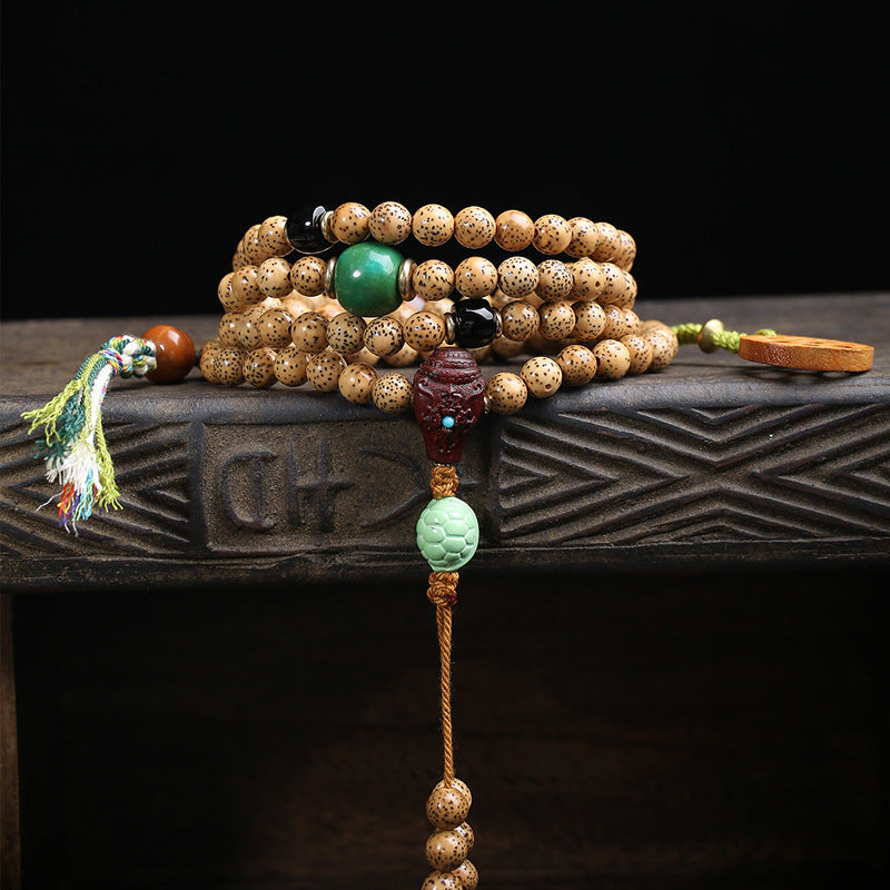 Detail of colorful tassel on Tibetan-style 108 bodhi mala prayer beads