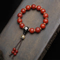 Authentic Tibetan natural red agate single wrap bracelet flat lay on white background